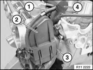 Remove belt pulley (2). Remove pipe (3). Illustration with engine removed. Pull off vacuum hose (1).