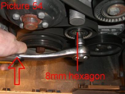 On this models use a 16mm socket wrench and release the pressure on the belt by pushing the