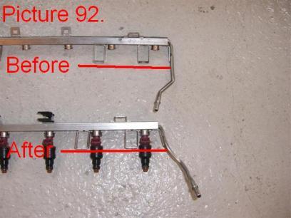89) then pull the rail from the hose. Drain the remaining fuel inside the rail.