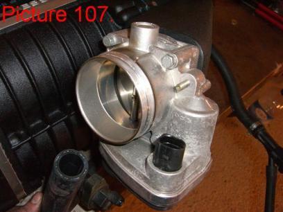The throttle body should be mounted with the electrical