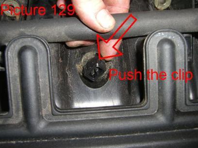 Push the clip on the side of the sensor and pull it out of the intake (Pic.129).