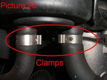 M8/13mm bolts holding the power steering reservoir tank. Unbolt them using a 13mm socket (Pic.19).