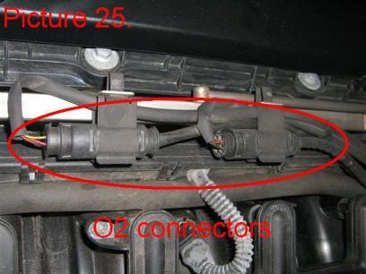 Remove these using a 10mm socket (Pic.26). Pull the fuel rail up together with the injectors.