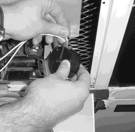 receptacle. 2. Remove the control panel. 3. Remove the 2 screws securing the switch to the heat shield. Figure 2-29. 4.