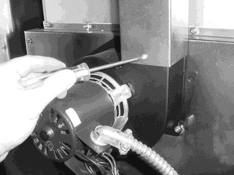 Loosen conduit from blower motor. Figure 2-46.