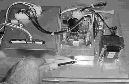 3. Pull the power switch connector from back of panel. Figure 2-58. Figure 2-59 4.