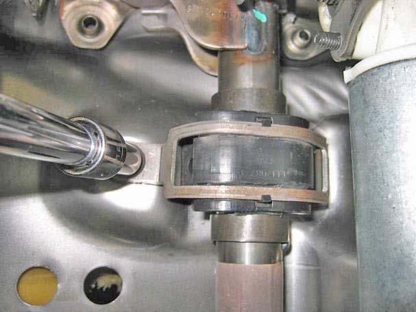 16. Install both front clamps with bolts as shown in Figure 17.