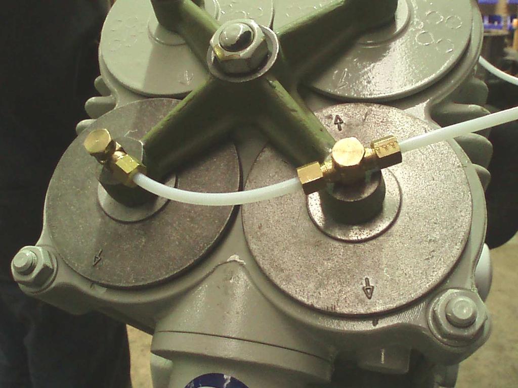 50. Fit air line between inlet valves on pressure gauge side and tighten nuts. 51.