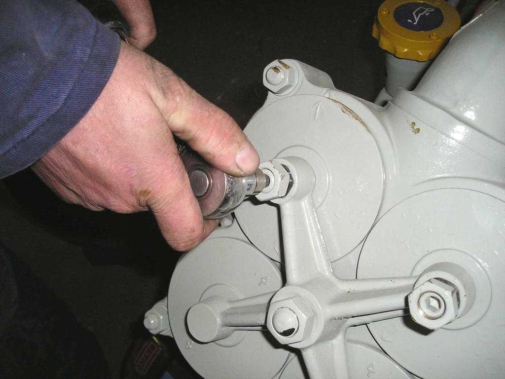Two valve adjusting nuts per side. 5.