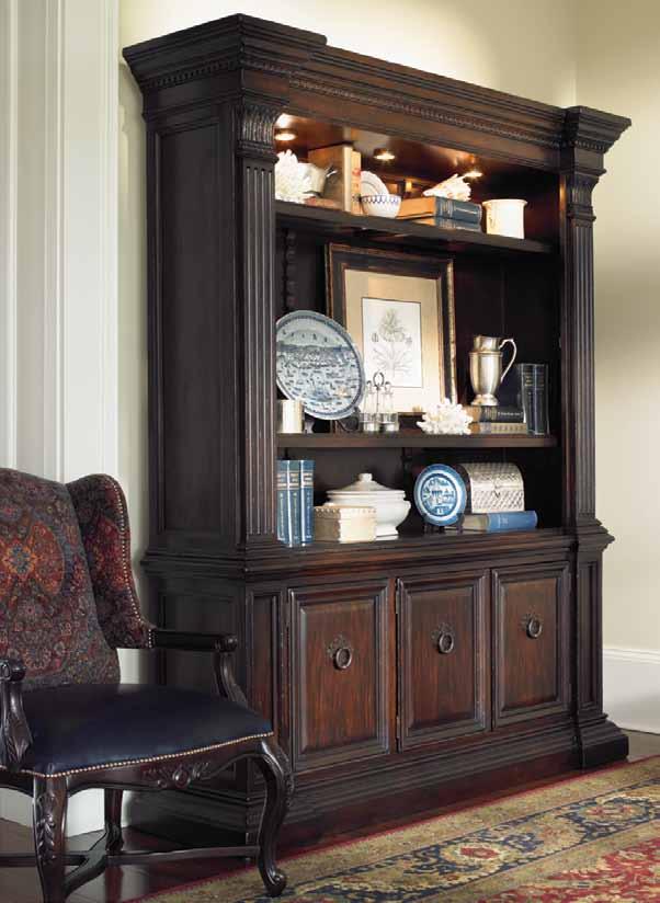 statement piece to anchor any room. Three doors in the base unit have adjustable shelves for generous storage.