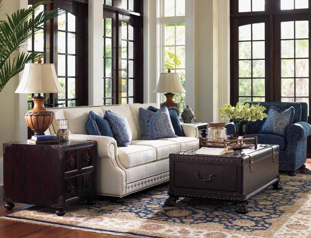 LIVING ROOM y The allure of eclectic materials and custom hardware blend with a rich layering of patterns, textures and colors in the upholstery to create a