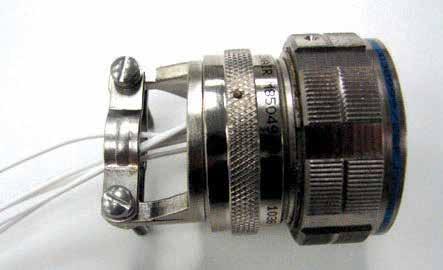 When tightening screws, pressure should be applied in the same direction that clamp is threaded to rear threads of connector.