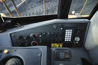 EASE OF OPERATION. The main control panel on the 854K is located to the right of the operator s seat, keeping everything within reach of the operator.