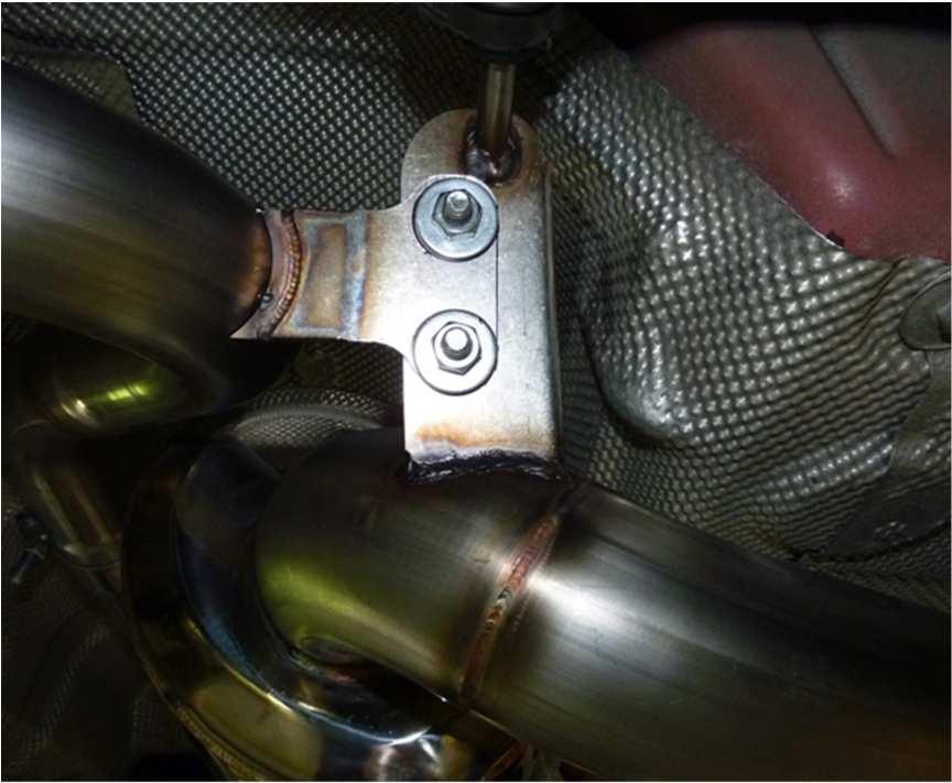 Use supplied coupler and two 3.0" Accu-Seal clamps to attach factory mid pipe to the muffler inlet. Align tips in valance, tighten all clamps, including those on Performance Mid Pipe (if installed).