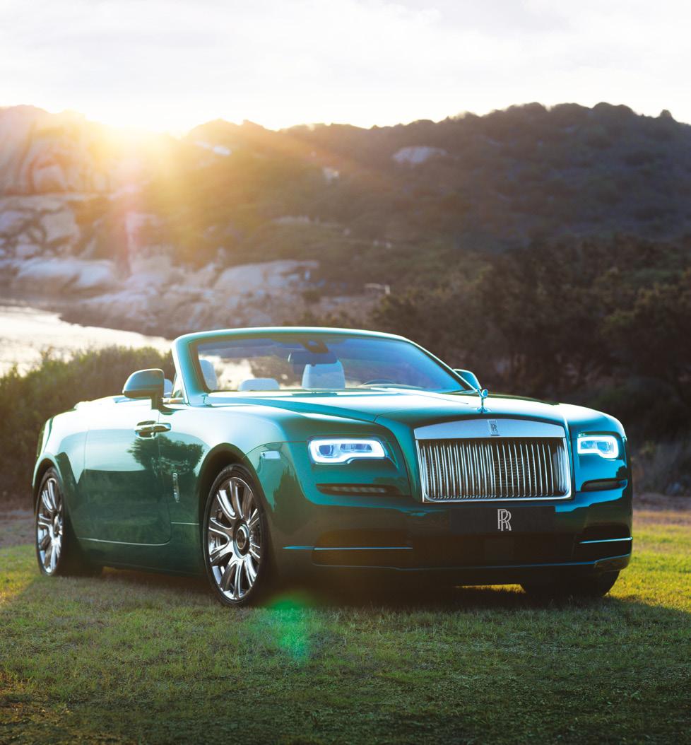 The unique Emerald Green exterior is offset by a distinctive Seashell and Green leather interior, with
