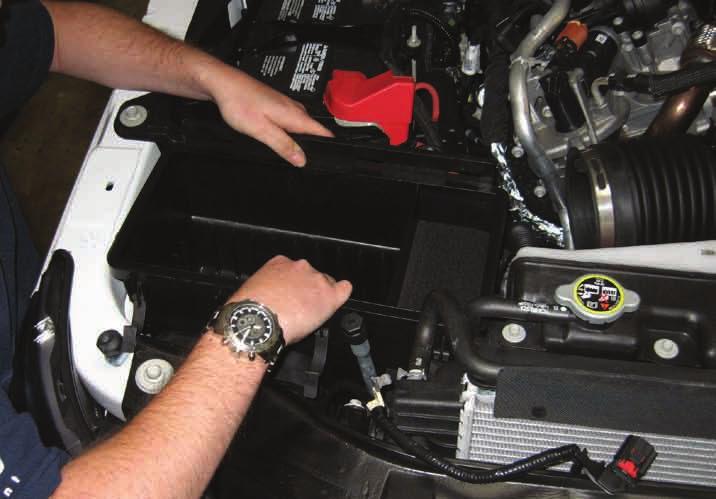 8. Remove the stock air filter housing from the vehicle. See Figure 7. 9. Remove the stock fresh air intake gasket from the stock air filter housing and install it on the Banks Ram-Air filter housing.