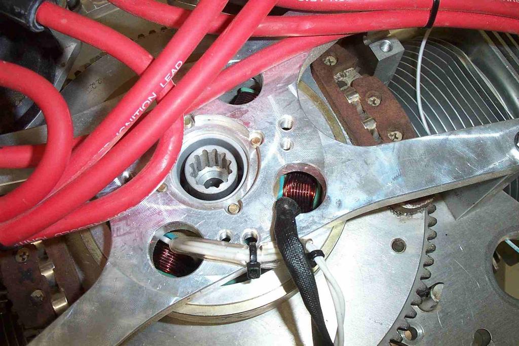 Either red wire on the D.O.D.E.S can plug into the No.4 on the tachometer. The other red wire plugs onto the positive bus bar. The grey wire plugs into the No. 8 connector on the tachometer.