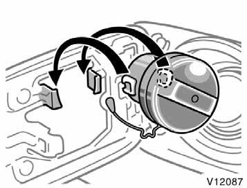 To remove the fuel tank cap, turn the cap counterclockwise by 90 degrees (to the pressure point 1), and then turn it an additional 30 degrees (to point 2). Pause slightly before removing it.
