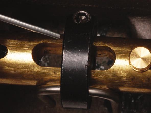Ensure the clamping bolt is on the opposite side from the opening where the microswitch valve will be installed.