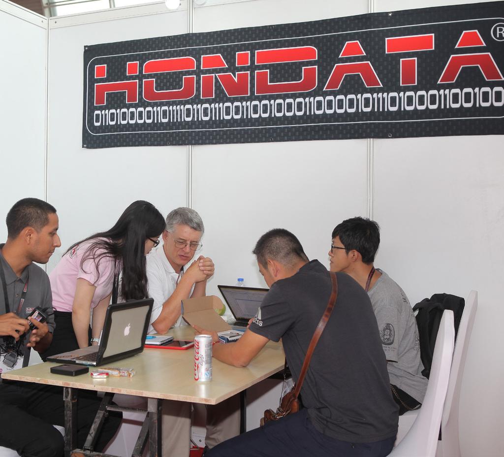 SEMA n INTERNATIONAL n For our company, it was a matter of being in the right place at the right time with the right product, said Doug MacMillan (third left), co-founder of Hondata Inc.
