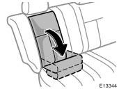 1. Separate the fastener tapes under the right rear seatback and fold the separated part of the seatback down while