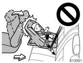 Never put rear- facing child restraint system on the front seat because the force of the rapid inflation of the passenger airbag can cause death or serious