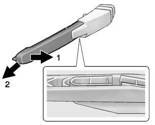 Pull the wiper arm a short distance away from the glass (1). 2. Pull the blade out from the arm (2).