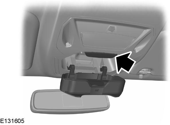 Available console features include: Press near the rear edge of the door to open it.