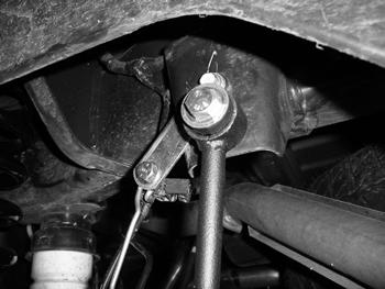 Tighten upper control arm hardware to 120 ft-lbs. 28. Install rear trackbar into relocation bracket with OE bolt and nut. Tighten to 95 ft-lbs.
