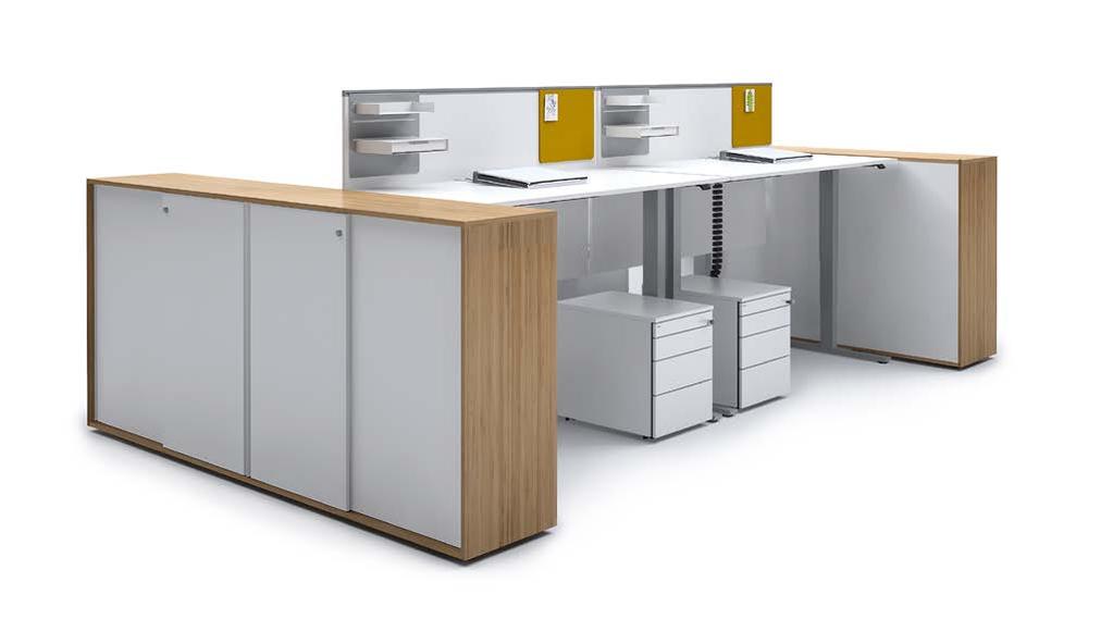 Inspiration #0 Lift Desk Pure in two-sided spine arrangement, face-to-face and back-to-back, with