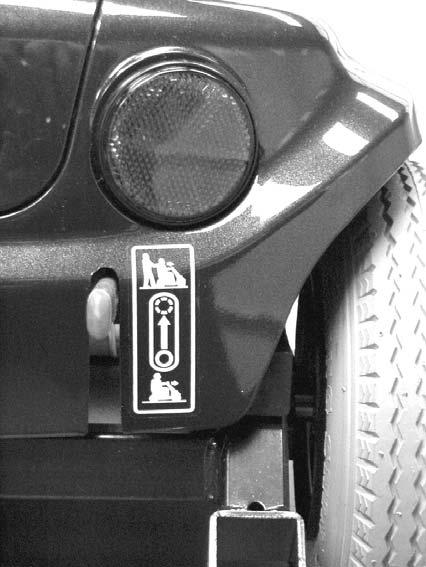 SECTION 6 OPERATION OF THE POWERED SCOOTER Engaging/Disengaging the Brake Release Lever Ensure that the brake-release lever is in the engaged position before driving.