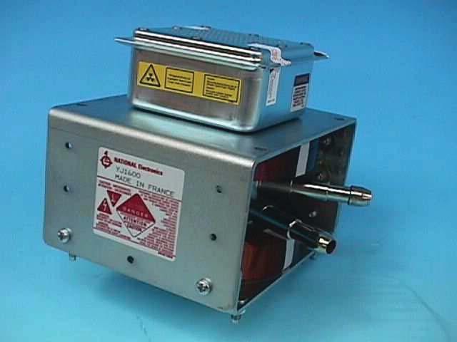 Packaged, metal-ceramic, water cooled continuouswave magnetron with integral RF cathode filter intended for use in industrial microwave heating applications.