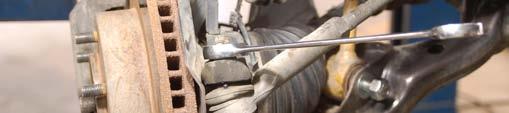 8. Remove cotter pin from the outer tie rod end on the steering
