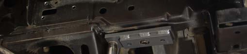 Locate the sway bar relocation brackets and