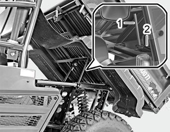 OPERATION 5-21 Unloading (manual model) 1. Open the tailgate with both hands. Be careful as the tailgate can open abruptly due to cargo on the cargo bed. 2.