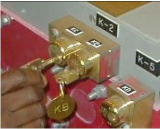 ) Key KB is now held captive in Key Lock K2 and Key KC is now available. Figure 3.
