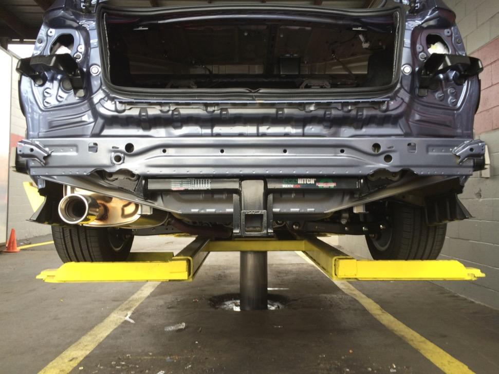 Replace styrofoam bar onto impact bar and reinstall bumper fascia and light assemblies by following steps in reverse from Step 8.