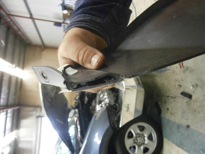 Finishing the bumper: Remove the small piece behind the