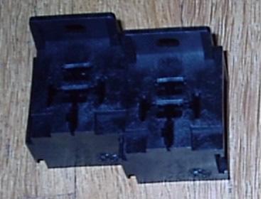 A pair of sockets being pushed into tandem, and the components required for one module: Relays Just about any brand of relay will do as long as it is a 12V