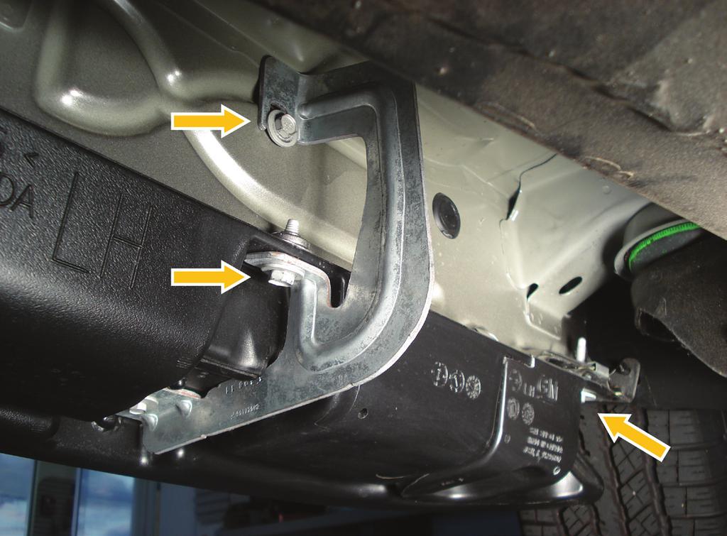 D rop driver s side running board by removing nine 3mm bolts from running board mounting brackets.