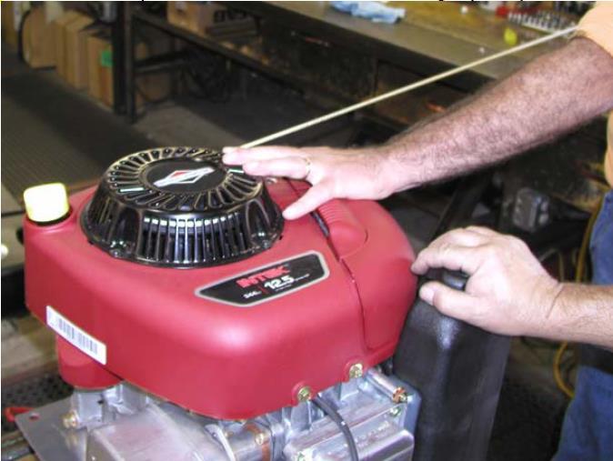 This will allow you to effectively tighten the impeller fastener without the engine shaft rotating.