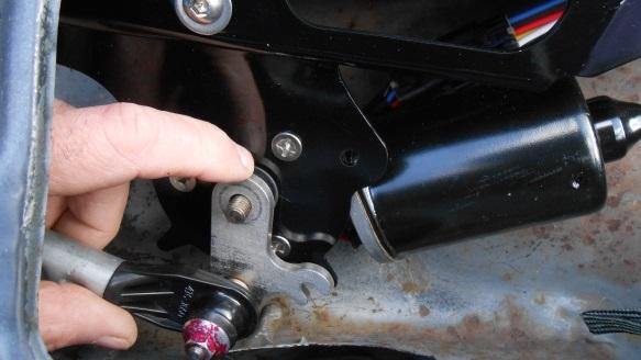 The Drive Arm To add the Drive arm to the motor: 1. Remove the loose 13mm nut from the Motor Spindle. 2.