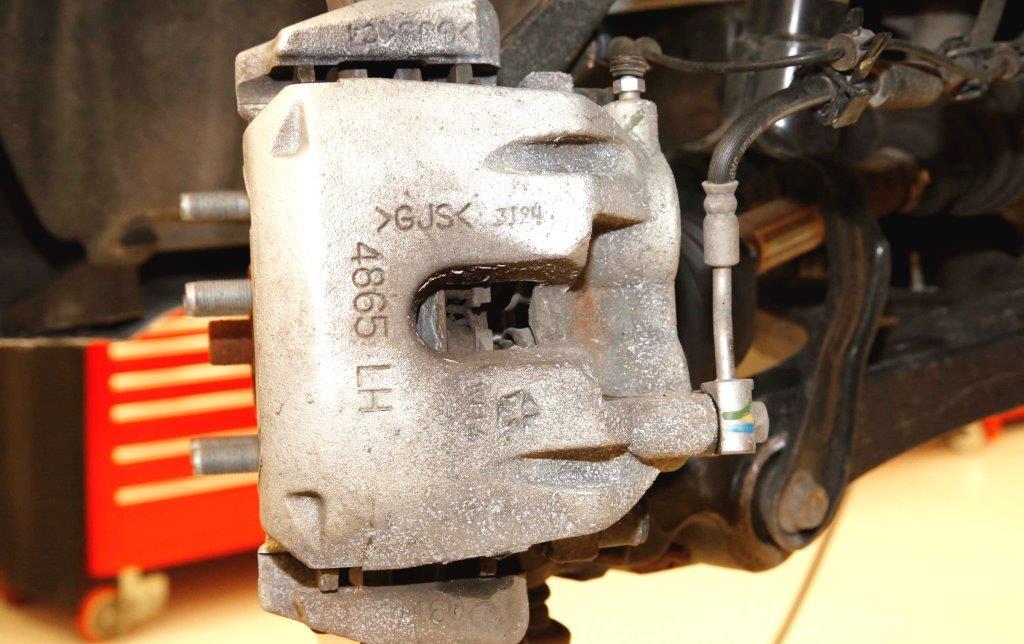 Safety Recall S16 Left Front Brake Caliper Page 3 Service Procedure A. Inspect Left Front Brake Caliper Date Code 1. Lift the vehicle on an appropriate hoist. 2.