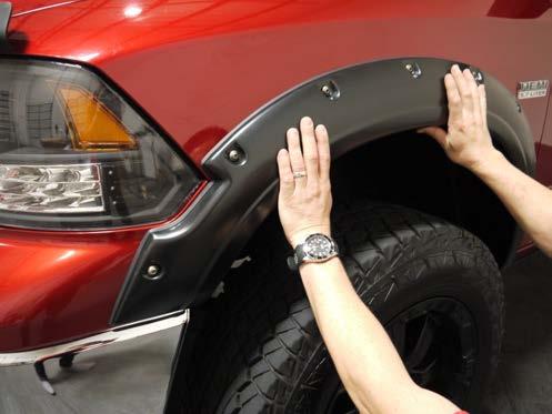 For models equipped with factory fender flares, removal of