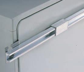 UPM, Pole mounting kits Uniplast Modular accessories UDS, Door stop/panel stop Description: At the rear of the enclosure, C-profiles are mounted on the wall mounting brackets UWB,