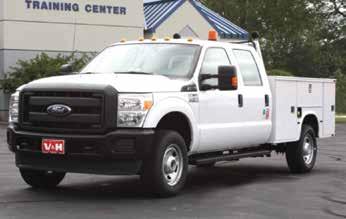 Spec 32 Service Body Crew Cab Full Size pickup, 4WD, Service Body Service Body - Lo-Pro Body - Standard Shelving Package - Master Locking System - Drop Down Tailgate - Grip Strut Rear Bumper