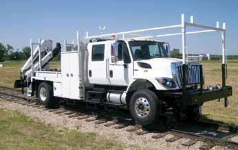 spec 52 medium section truck Crew Cab Chassis, 4WD w/railgear Body - 14 - Steel Platform - Streetside upright Gas Bottle Compartment Vented; E-Track - Streetside Underbody Compartment - Curbside