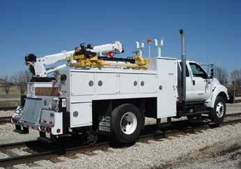 w/tie Downs - Rail Rack w/tie Downs - Rear Mud Flaps - Painted to Match Chassis Crane - 25,000 Ft/Lbs - Proportional Radio Remote Control - Hydraulic/Manual Reach to 20 - Planetary Winch - Double