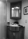 cabinet with mirrored hardwood framed door S S S Wallpaper border S S S Bedroom.