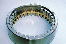 Photo O-2 Retainer of spherical roller bearing Breakage of partitions between pockets of pressed steel retainer Photo O-3